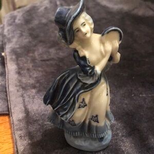 Charming Blue and Cream porcelain Figurine